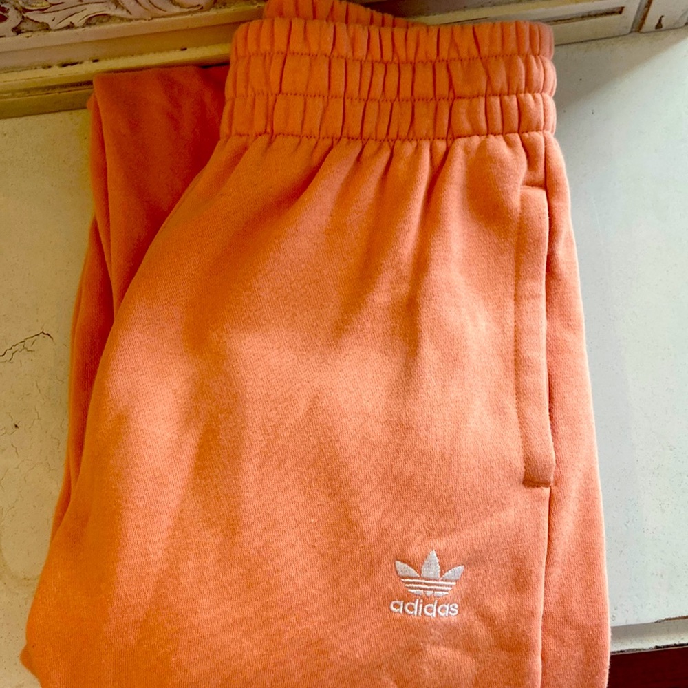 Adidas womens salmon color joggers. Never worn. Excellent condition. Size 6